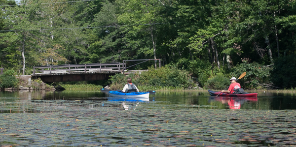 Rick and Suzy near the bridge to Camp Pemi on Lower Baker Pond. 