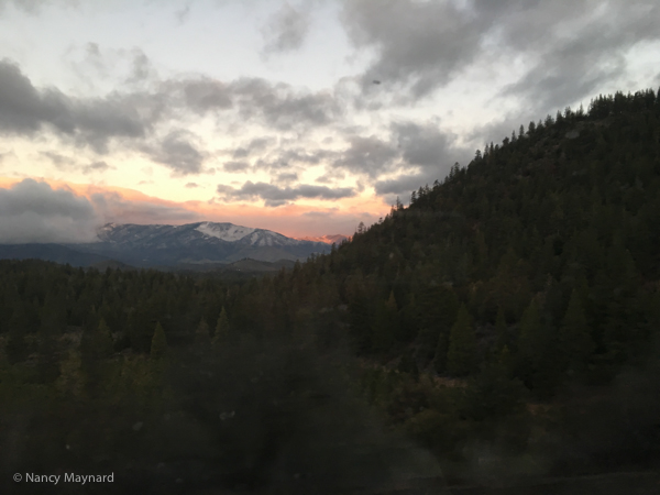 Sun rise with snow on the mountain tops. 